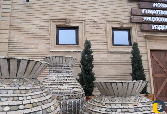 Архитектурная подсветка зданий из камня. Медиафаса