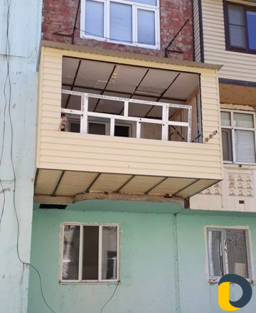 Балконы расширение обшивка