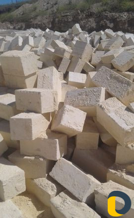 Камень песок