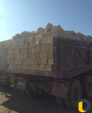 Камень песок