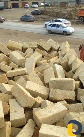 Камень песок