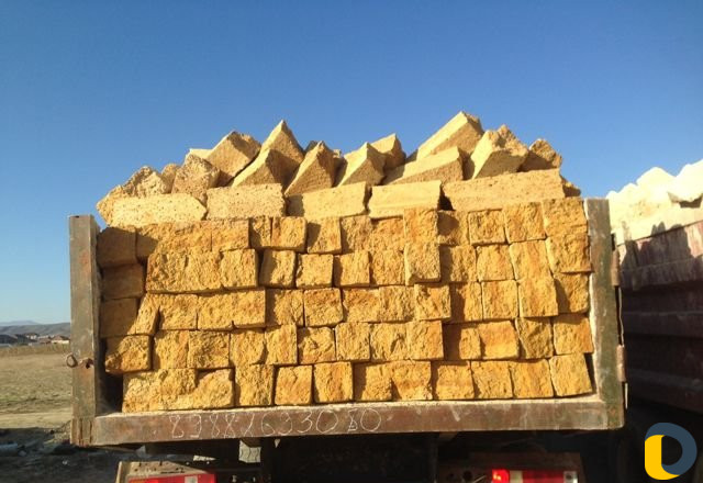 Камень песок