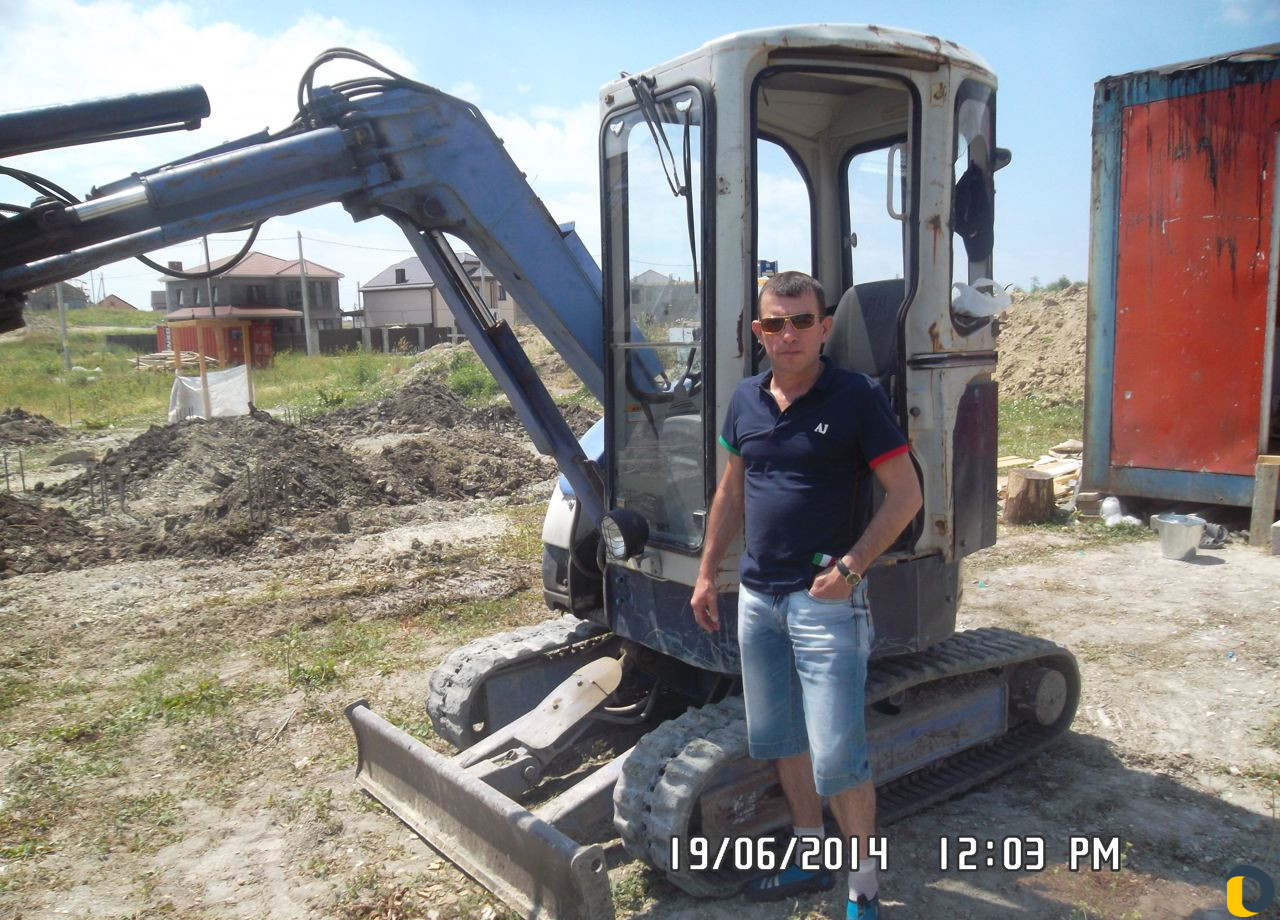 Мини-экскаватор