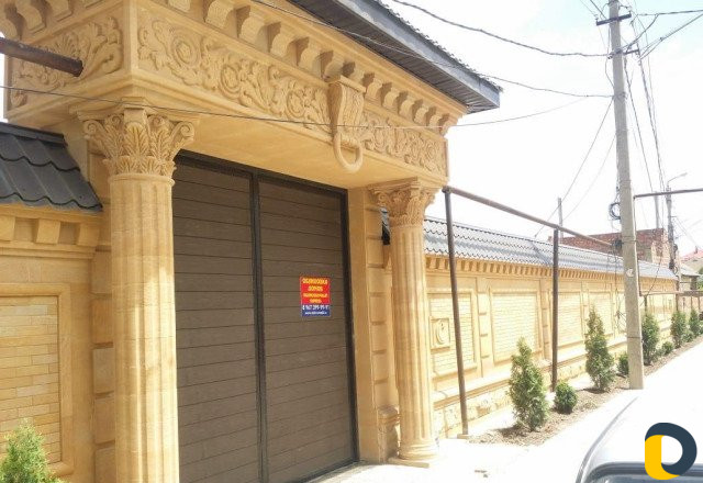 Облицовка фасада дома камнем