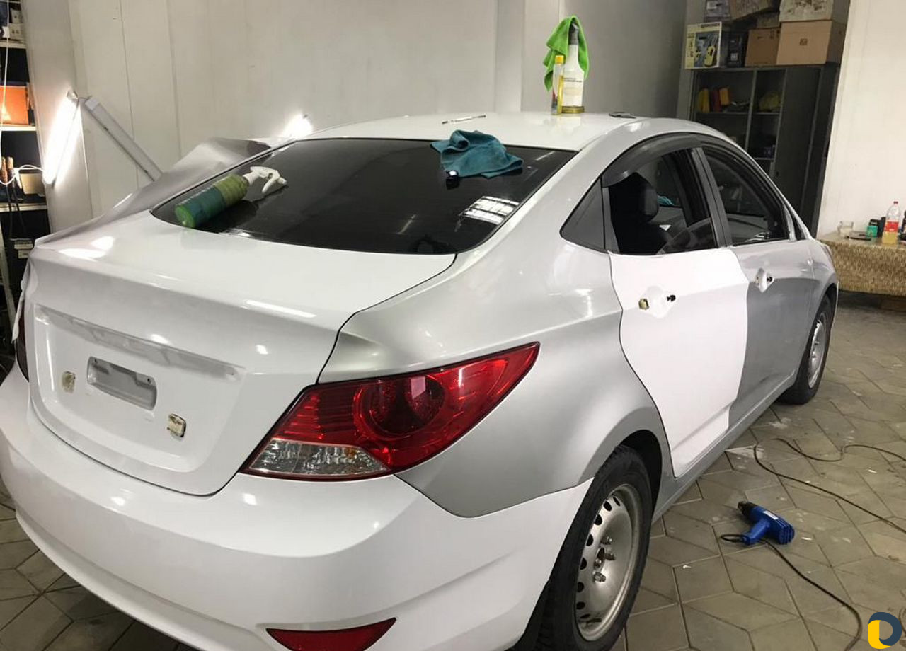 Оклейка плёнкой автомобиль под такси