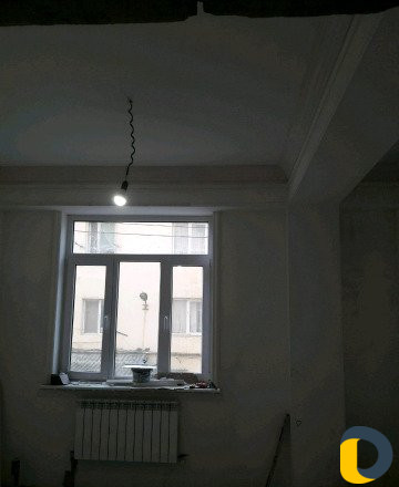 Опытный штукатурщик