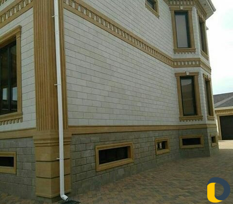 Отделка фасада дома из природного камня