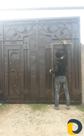 Покраска ворот на дом