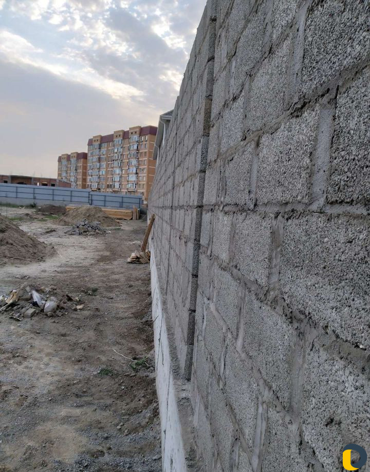 Строители