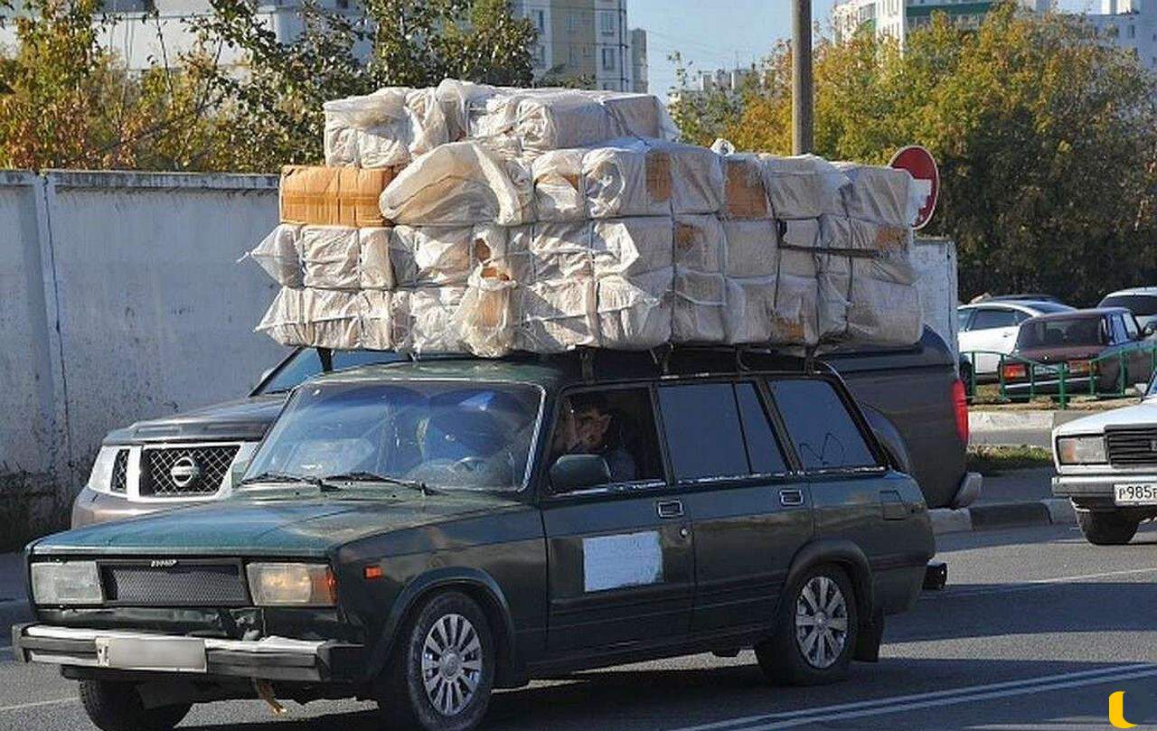 Такси фургон с верхним багажом