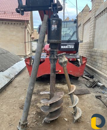 Телескопический погрузчик,бур