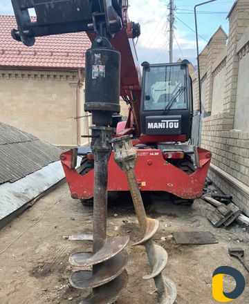 Телескопический погрузчик,бур