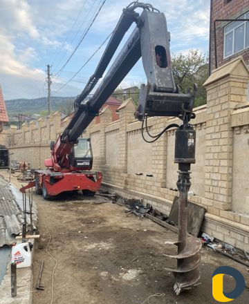 Телескопический погрузчик,бур