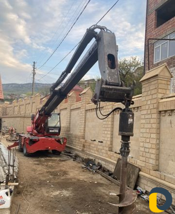 Телескопический погрузчик,бур