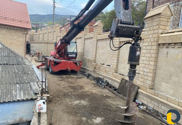 Телескопический погрузчик,бур