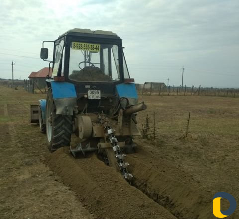 Траншеекопатель Работаем