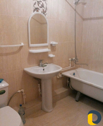 Укладка кафеля в ванной и на кухне