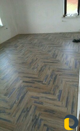 Укладка ламината и паркетной доски. Плинтуса