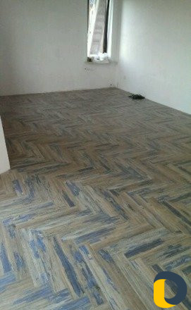 Укладка ламината и паркетной доски. Плинтуса