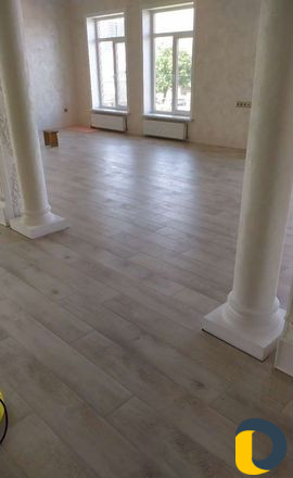 Укладка ламината и установка плинтусов