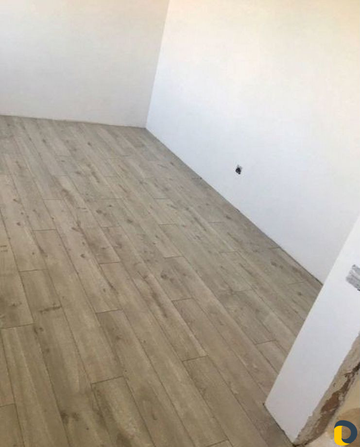 Укладка ламината,укладка кварцвинила