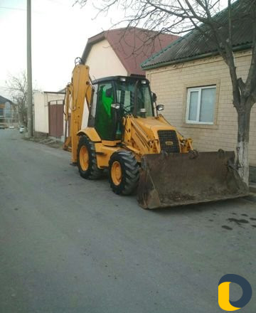 Услуги экскаватор погрузчик хасавюрте