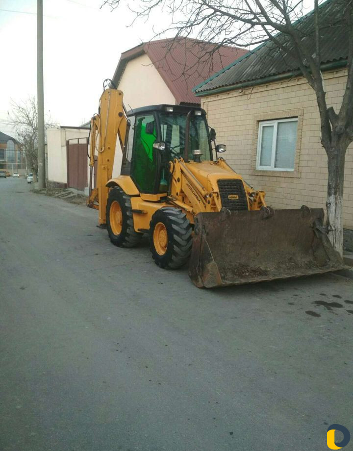 Услуги экскаватор погрузчик хасавюрте