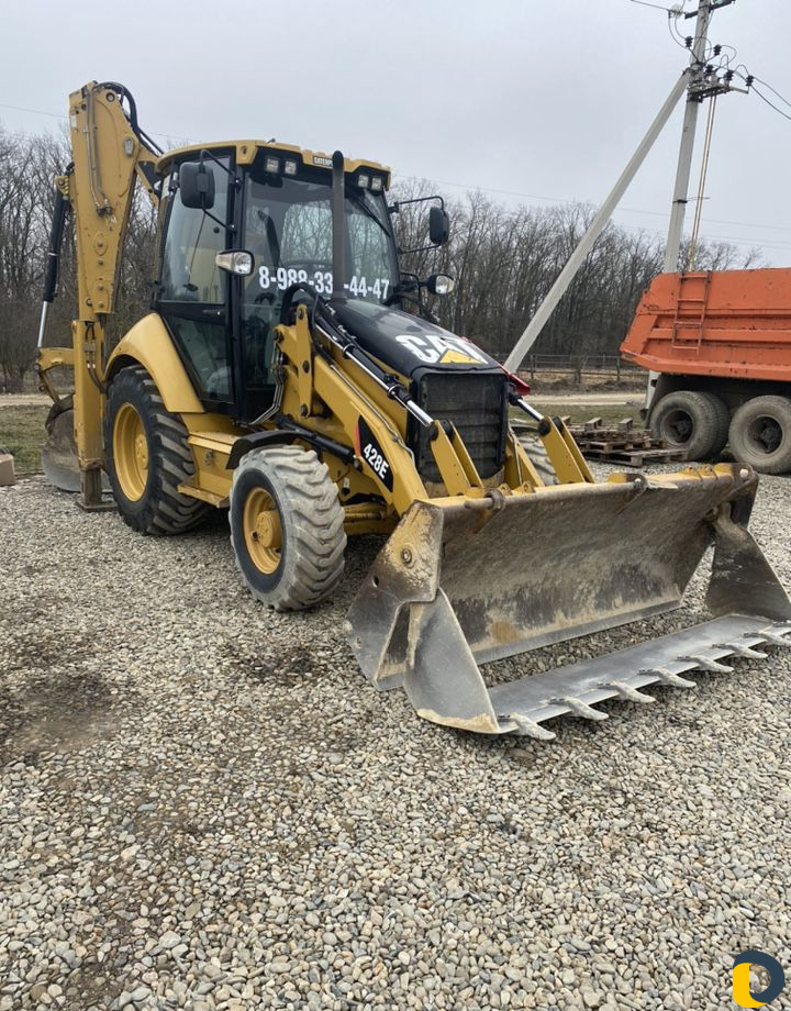 Услуги экскаватора-погрузчика