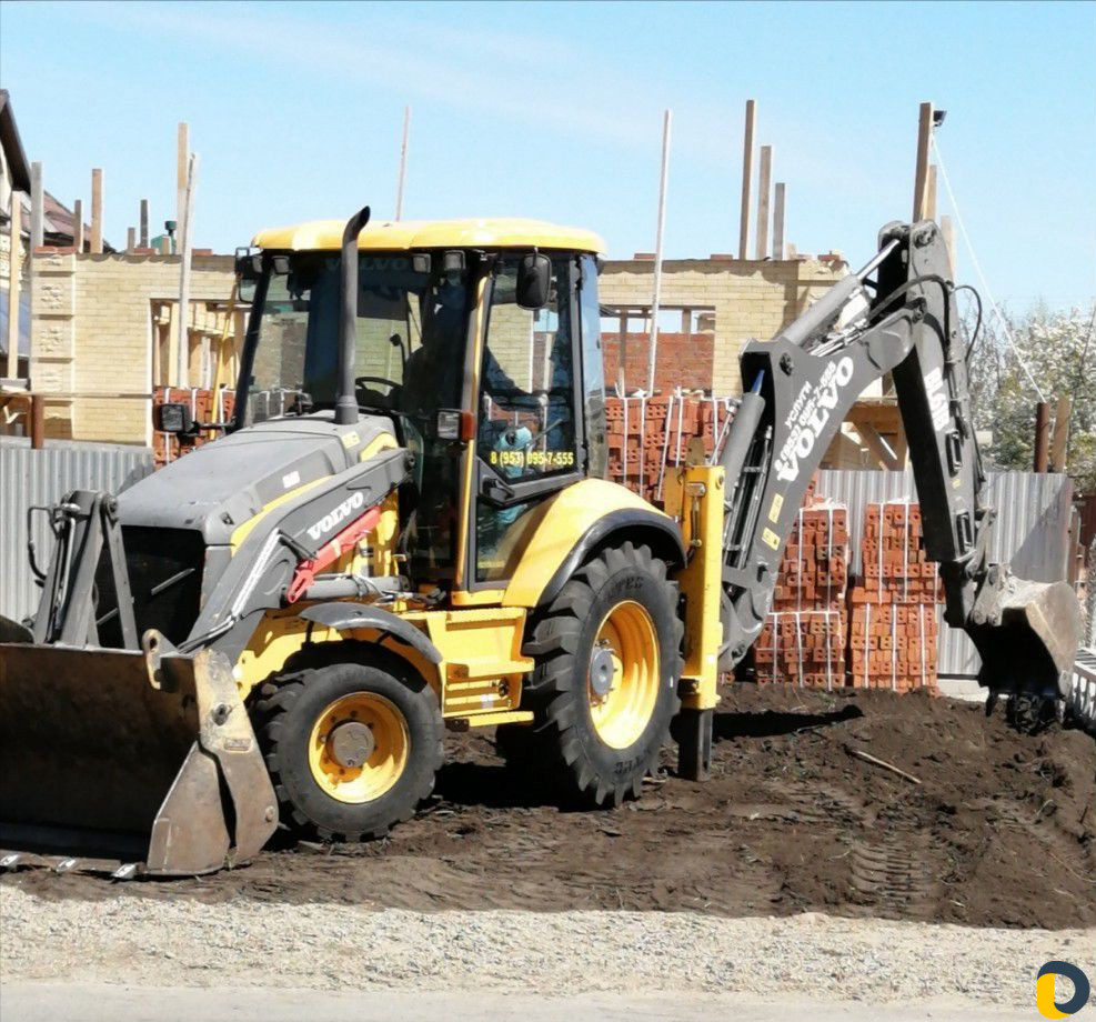 Услуги экскаватора-погрузчика