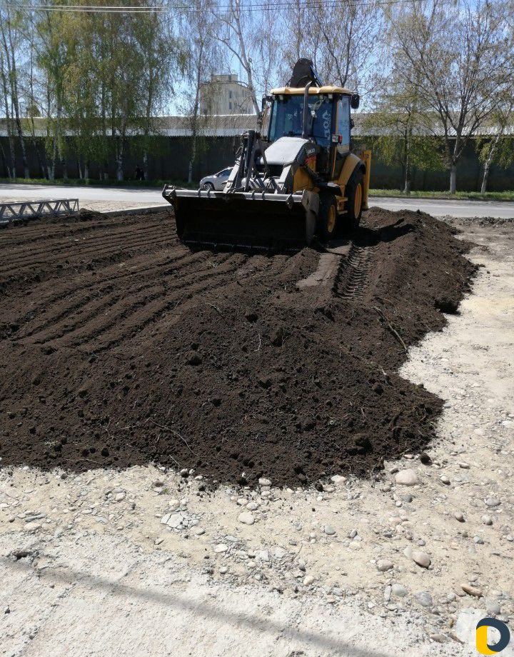 Услуги экскаватора-погрузчика