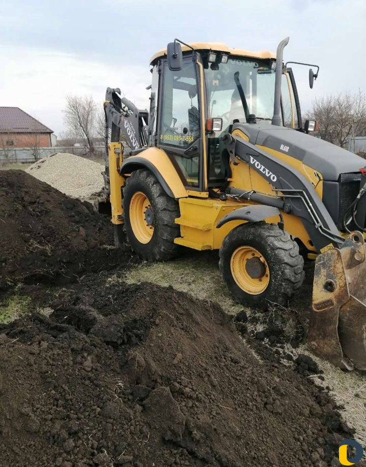 Услуги экскаватора-погрузчика
