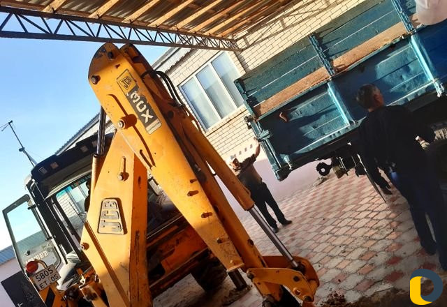 Услуги Экскаватора погрузчика