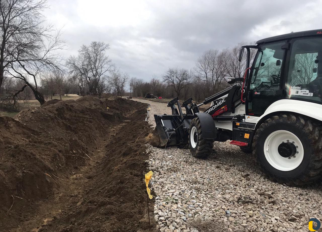 Услуги экскаватора погрузчика