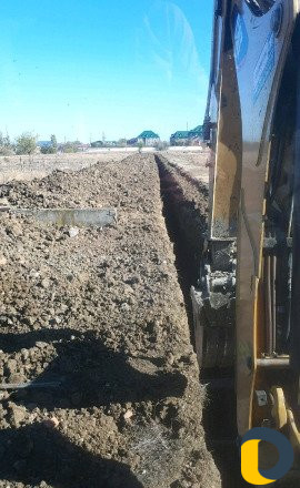 Услуги экскаватора-погрузчика