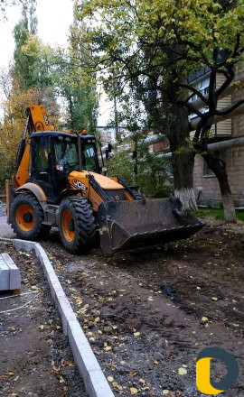 Услуги экскаватора-погрузчика