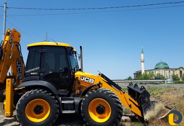 Услуги экскаватора-погрузчика