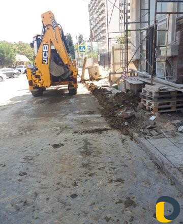 Услуги экскаватора-погрузчика