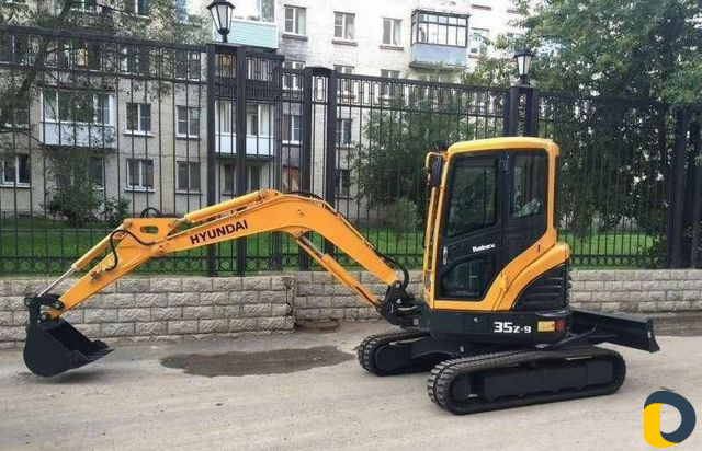 Услуги мини экскаватора. Копаем ямы и траншеи