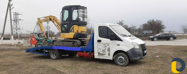 Услуги мини экскаватора. Копаем ямы и траншеи