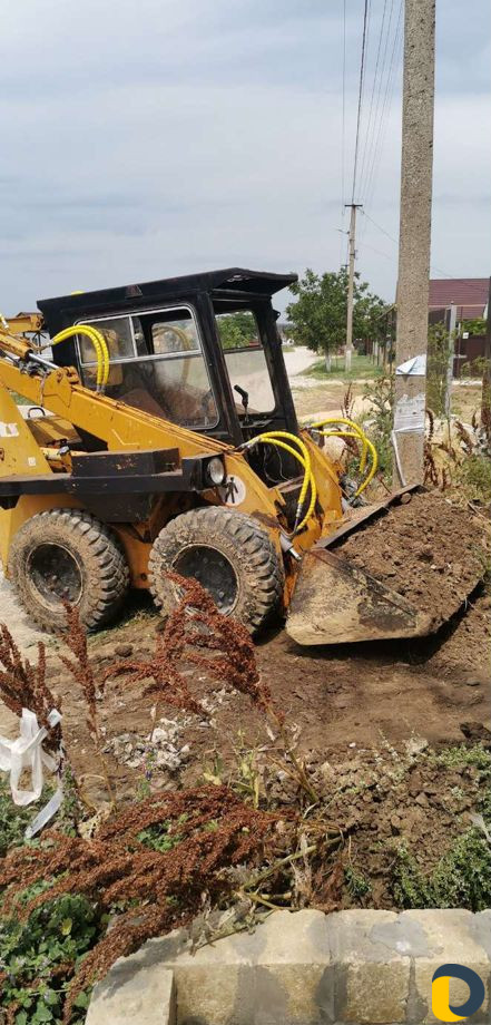 Услуги минипогрузчика Bobcat, UNC 060