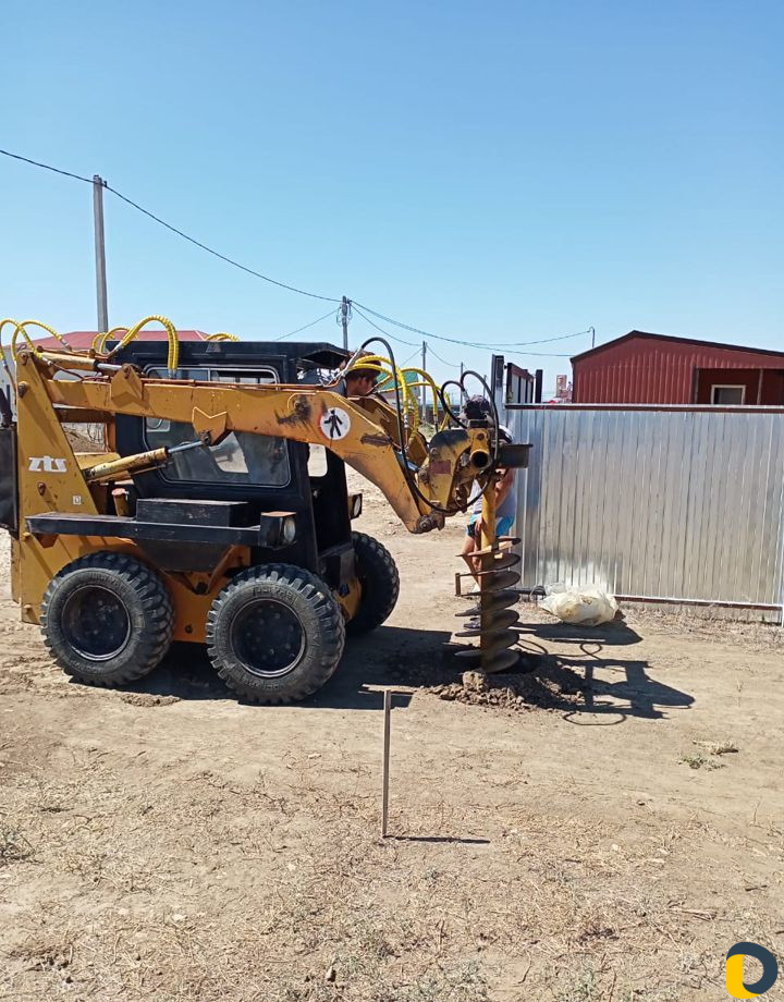 Услуги минипогрузчика Bobcat, UNC 060