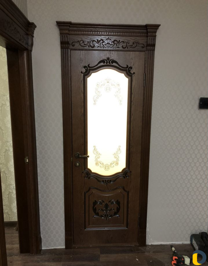 Установка межкомнатных дверей доборов, капителей