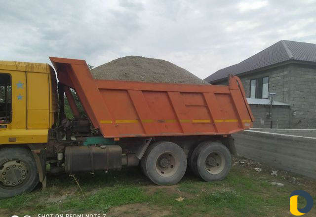 Вывоз грунта и строительных отходов